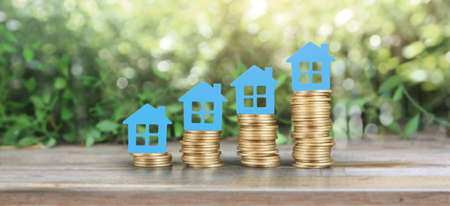 Model house mock up on coins. property real estate investment coの写真素材