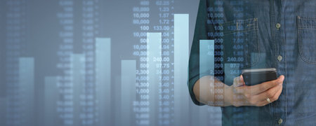 Businessman plan graph growth and increase of chart positive indicators in his business on...
