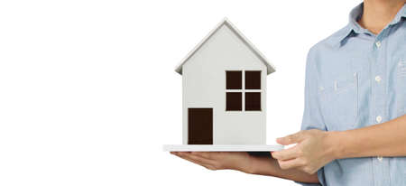 House Residential Structure in a hand ,business home ideaの写真素材