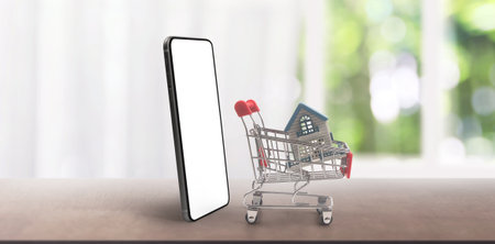 Toy shopping cart Consumer society trend on smartphoneの写真素材