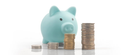 Model of detached miniature house mock up and coins. property real estate investment conceptの写真素材