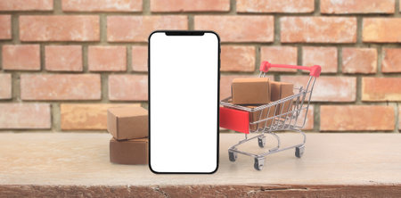 Toy shopping cart Consumer society trend on smartphoneの写真素材