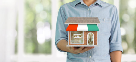 House Residential Structure in a hand ,business home ideaの写真素材