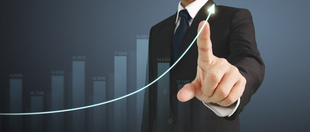 Businessman plan graph growth and increase of chart positive indicatorsの写真素材
