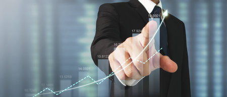 Businessman plan graph growth and increase of chart positive indicatorsの写真素材