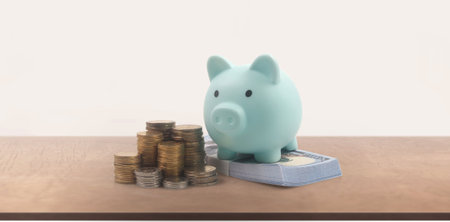 Coin with trading graph, financial investment concept and a Piggy bankの写真素材