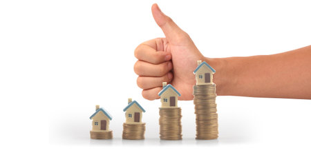 House Residential Structure in hand ,business home idea, model house and coinの写真素材