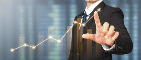 Businessman plan graph growth and increase of chart positive indicatorsの写真素材