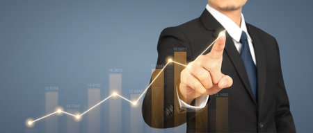 Businessman plan graph growth and increase of chart positive indicatorsの写真素材
