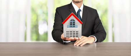 House Residential Structure in hand ,business home idea, model houseの写真素材