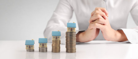 House Residential Structure in hand ,business home idea, model house and coinの写真素材