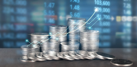 Stack of coin with trading graph, financial investment conceptの写真素材