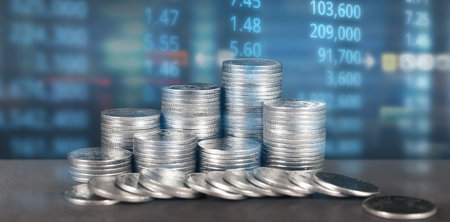 Stack of coin with trading graph, financial investment conceptの写真素材