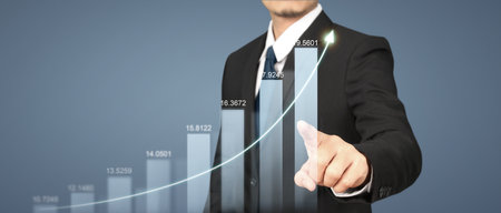 Businessman plan graph growth and increase of chart positive indicatorsの写真素材