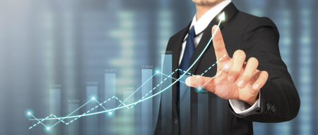 Businessman plan graph growth and increase of chart positive indicatorsの写真素材