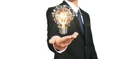 Humans hold light bulbs in hand innovative technology and creativityの写真素材