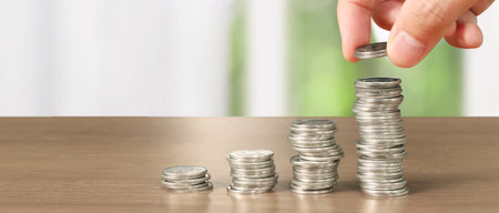 Stack of coin with trading graph, financial investment conceptの写真素材