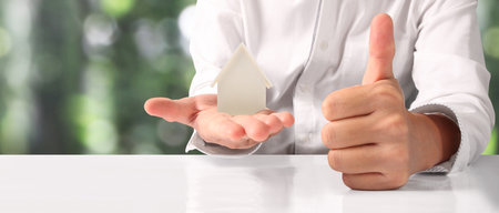 House Residential Structure in hand ,business home idea, model houseの写真素材