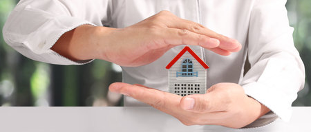 House Residential Structure in hand ,business home idea, model houseの写真素材