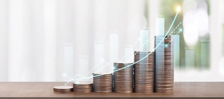 Stack of coin with trading graph, financial investment conceptの写真素材