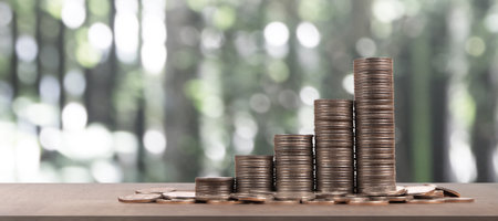Stack of coin with trading graph, financial investment conceptの写真素材