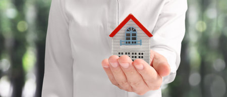 House Residential Structure in hand ,business home idea, model houseの写真素材