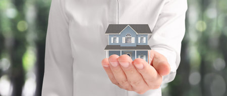 House Residential Structure in hand ,business home idea, model houseの写真素材