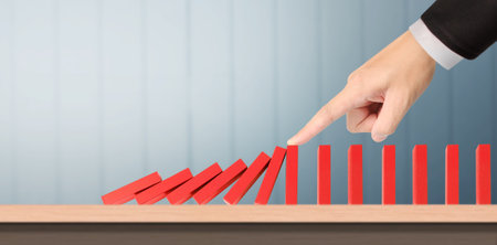 The Domino effect stopped by unique, Business Ideasの写真素材