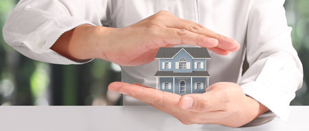House Residential Structure in hand ,business home idea, model houseの写真素材