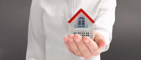 House Residential Structure in hand ,business home idea, model houseの写真素材