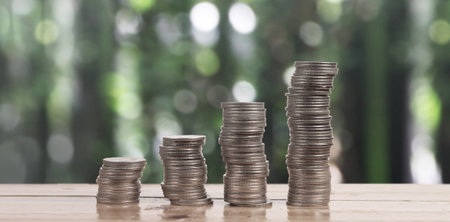 Stack of coin with trading graph, financial investment conceptの写真素材