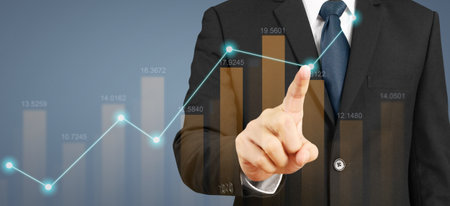 Businessman plan graph growth and increase of chart positive indicatorsの写真素材