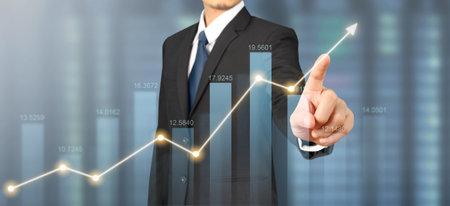 Businessman plan graph growth and increase of chart positive indicatorsの写真素材