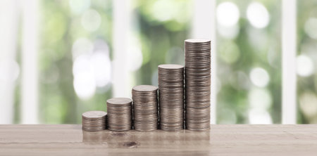 Stack of coin with trading graph, financial investment conceptの写真素材