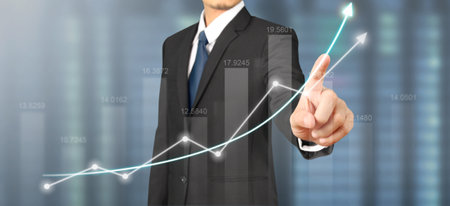 Businessman plan graph growth and increase of chart positive indicatorsの写真素材