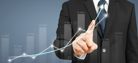 Businessman plan graph growth and increase of chart positive indicatorsの写真素材