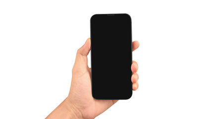 Hand holding smartphone device and touching screen in handの写真素材