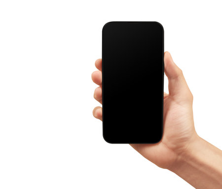 Hand holding smartphone device and touching screen in handの写真素材