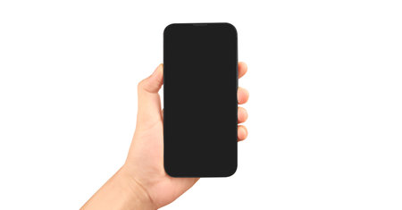 Hand holding smartphone device and touching screen in handの写真素材