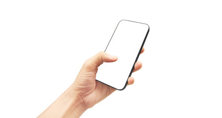 Hand holding smartphone device and touching screen in handの写真素材