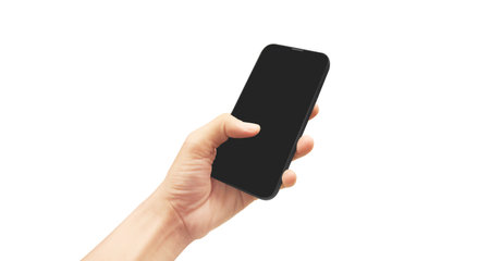 Hand holding smartphone device and touching screen in handの写真素材