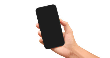 Hand holding smartphone device and touching screen in handの写真素材