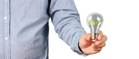 Humans hold light bulbs in hand innovative technology and creativityの写真素材