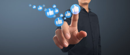 Man pressing modern social buttons social networkの写真素材