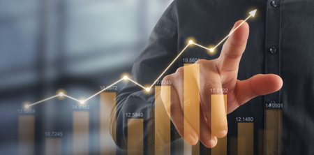 Businessman plan graph growth and increase of chart positive indicators in his business
