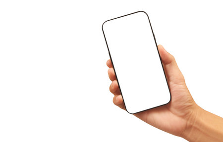 Hand holding smartphone device and touching screenの写真素材