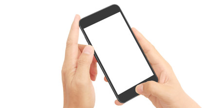 Hand holding smartphone device and touching screenの写真素材