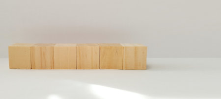 Wooden block stacking activity indoor space educational content minimalist environment top-down view skill developmentの写真素材