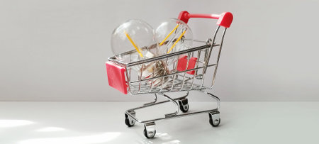 Shopping cart displaying unique beverage glasses minimalist studio product photography modern environment close-up viewの写真素材
