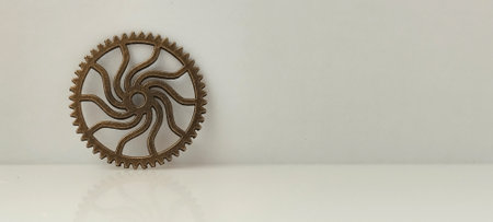 Intricate gear mechanism art studio product photography minimalist design close-up view mechanical artistryの写真素材